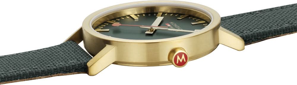 Unisex-armbandsur från sidan med grön urtavla och mörkgrönt tygband.