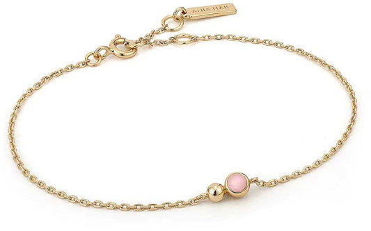 Guldpläterat armband med liten kulberlock och rosa pärldetalj