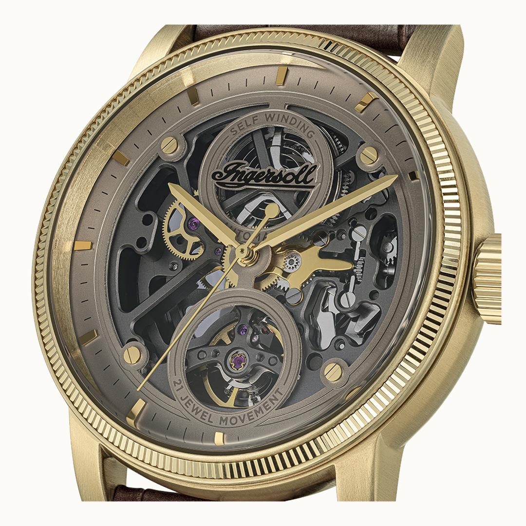 Ingersoll Automatik-Armbanduhr, Nahansicht Skelettwerk, goldenes Gehäuse, Mineralglas