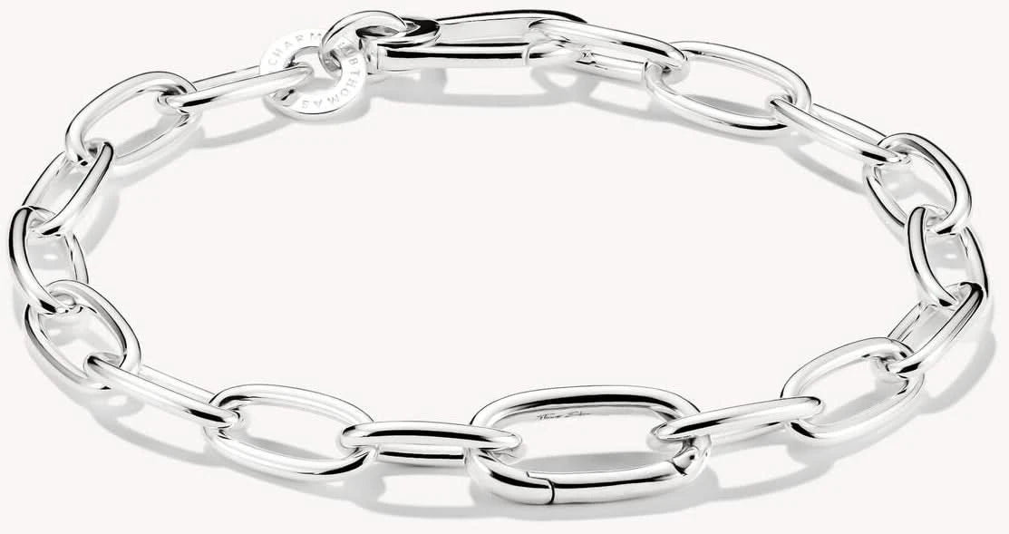 Charmarmband i silver med slutna länkar och en Connect-länk