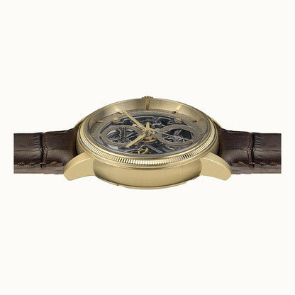 Ingersoll Automatik-Armbanduhr von schräg oben, sichtbares Werk, goldenes Gehäuse