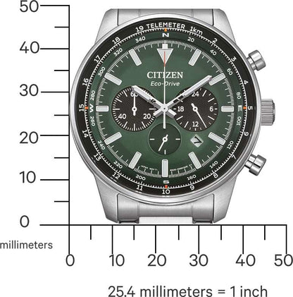 Herrklocka framifrån med grön urtavla, kronograf och tachymeter-bezel