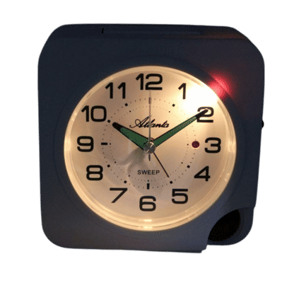 Väckarklocka med självlysande urtavla, gröna visare och svart boett