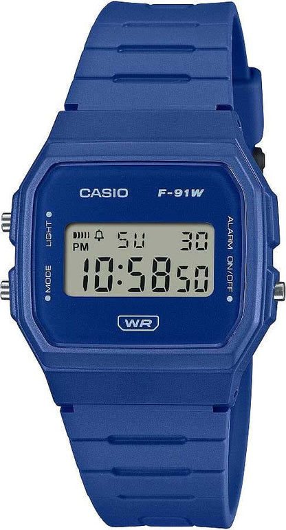 Digital damklocka med blått plastarmband och rektangulär LCD-display