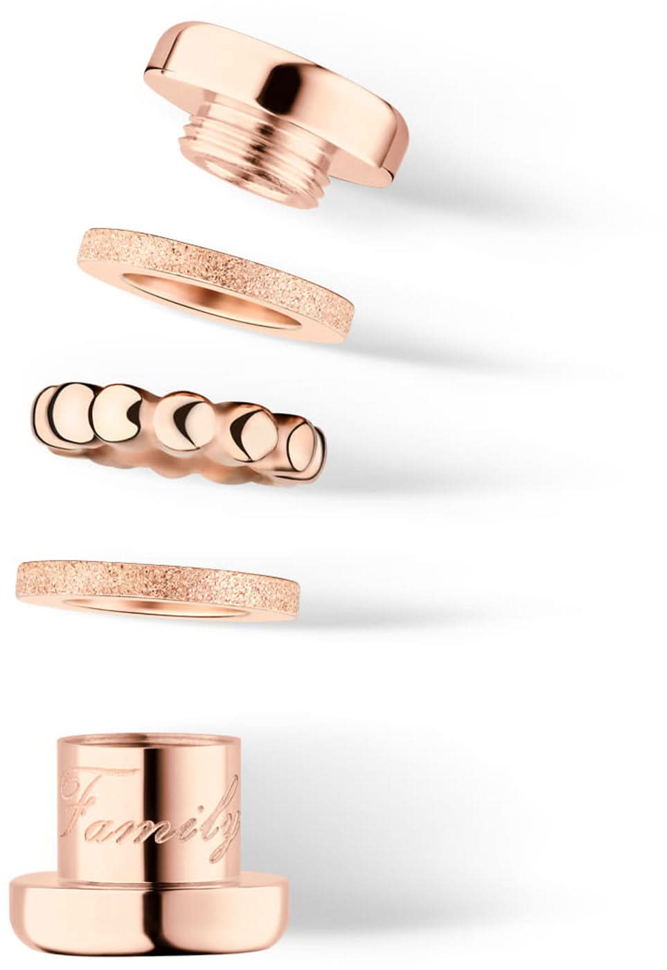 Roséguldpläterade delar i rostfritt stål, cylindriska, med hjärtmönster