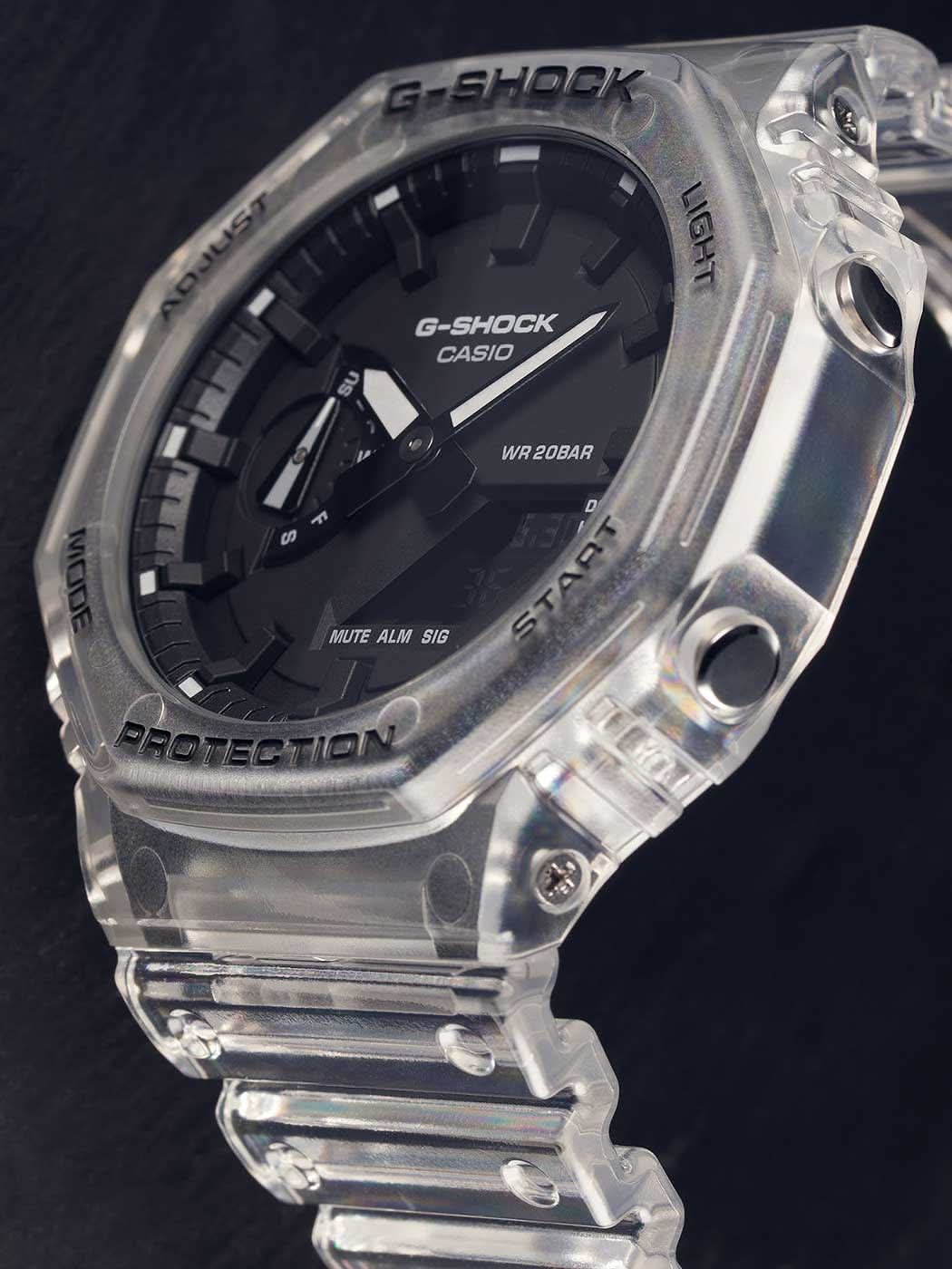 Armbandsur för herrar med transparent boett, svart urtavla och skyddsram