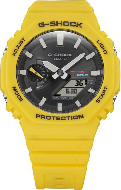 Casio G-Shock klocka med gult silikonarmband och svart urtavla med digital display