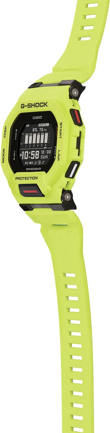 Neongrön sportklocka med gummiarmband, sidovy