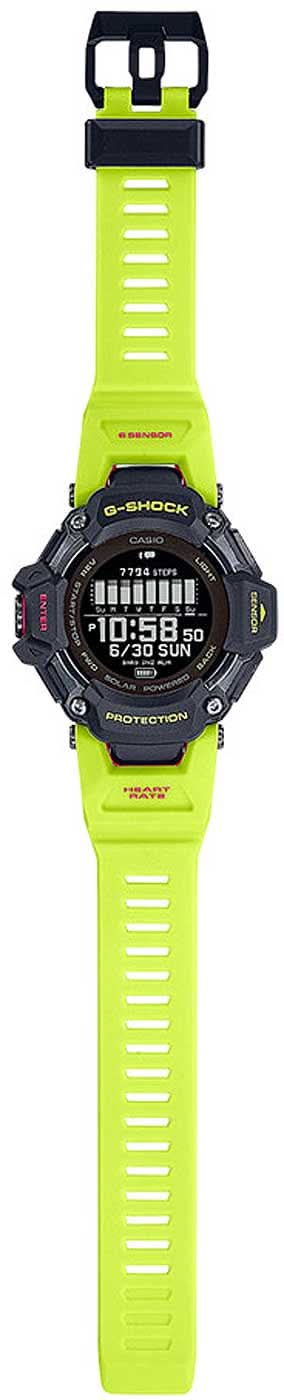 Casio G-Shock herrklocka: grön-gult armband, boett i svart, knappar på sidan