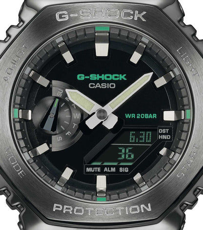 Casio G-Shock urtavla närbild, WR 20 BAR-indikator, MUTE ALT SIG, gröna accenter.