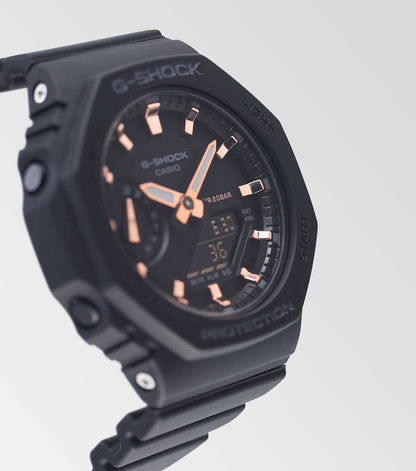 Casio G-Shock damklocka, svart boett med knappar och armband