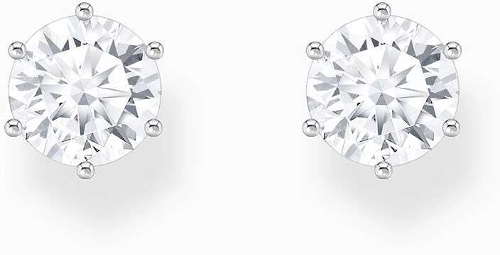 Silverfärgade örhängen med stor vit zirkonsten i gnistrande infattning