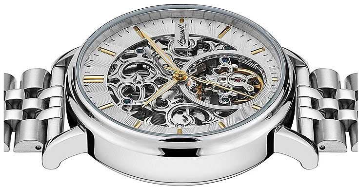 Herrklocka med öppet urverk i skelettdesign och silverfärgat metallarmband