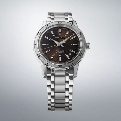 Seiko herrklocka med svart urtavla, silverfärgat armband i rostfritt stål och krona