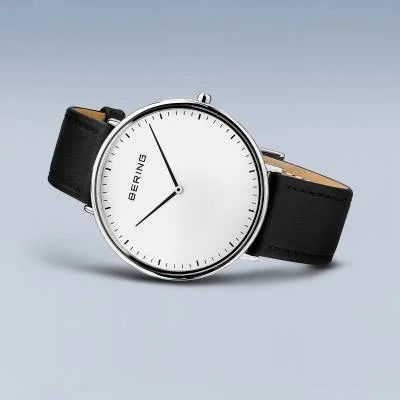 Bering Ultra Slim klocka med svart läderarmband och vit urtavla, smal profil