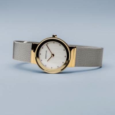 Damklocka med silverfärgat Milanese-armband och guldfärgade sidor, vit urtavla