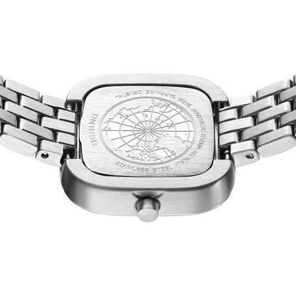 Damklocka med bakboett med graverat motiv, armband i silverfärgat rostfritt stål
