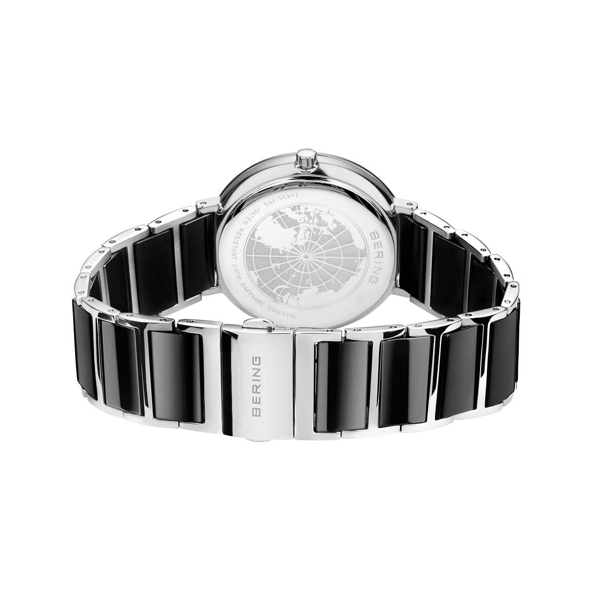 "Damklocka, bakvy med keramiskt armband i svart och silver, rund boett"