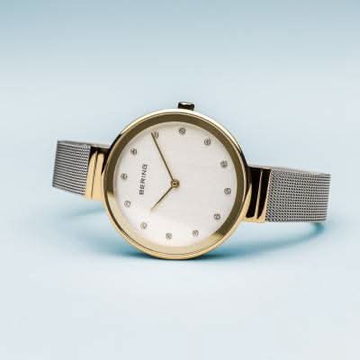 "Damklocka i sidovy: guldfärgad boettring, silverfärgat Milanese-armband"