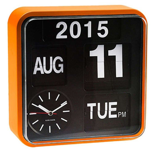 Väggklocka med orange ram, svart flip-kalender och tidsvisning