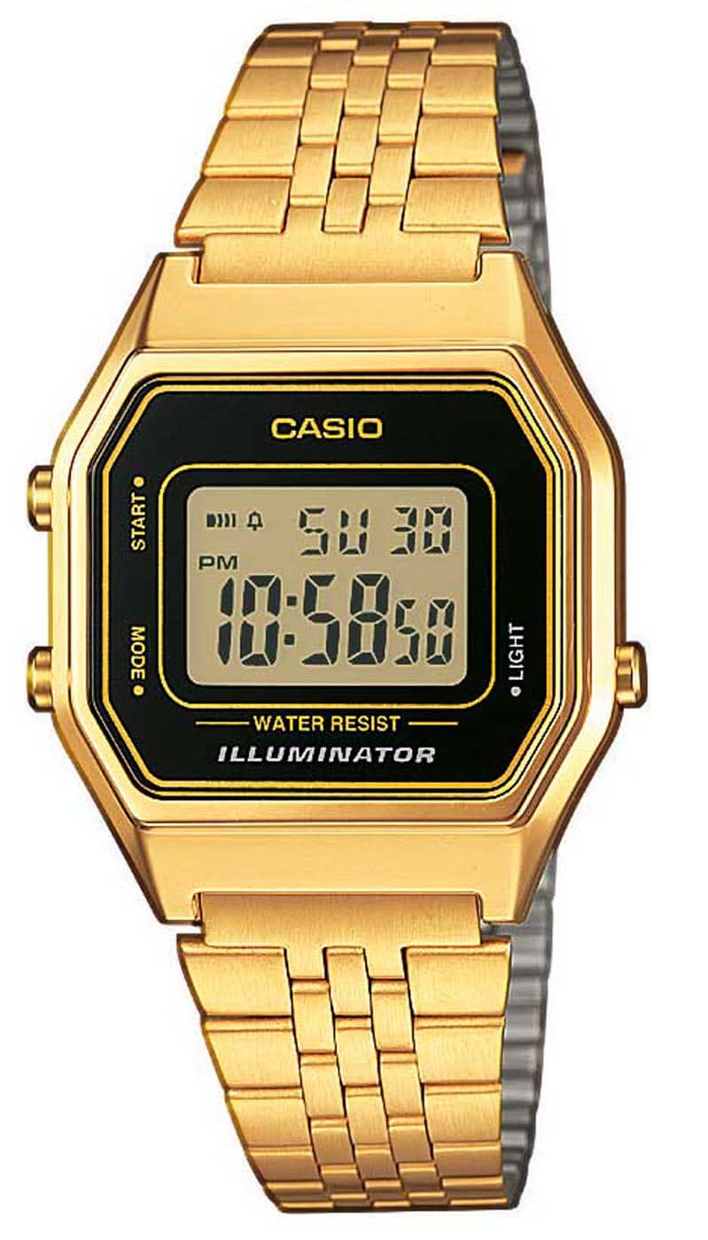 Casio damklocka med guldfärgat metallarmband, åttkantig digital display och belysning