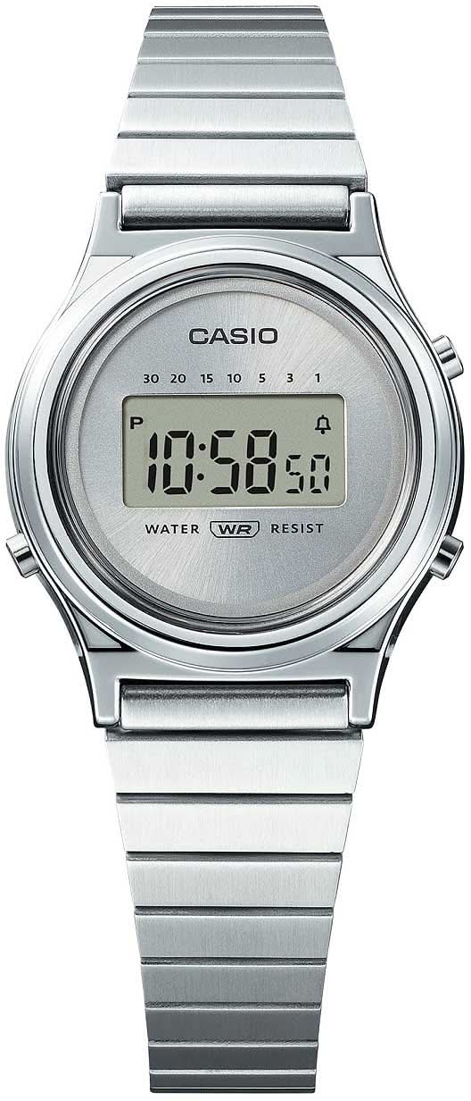 Casio damklocka med silverfärgat metallband och rund digital display