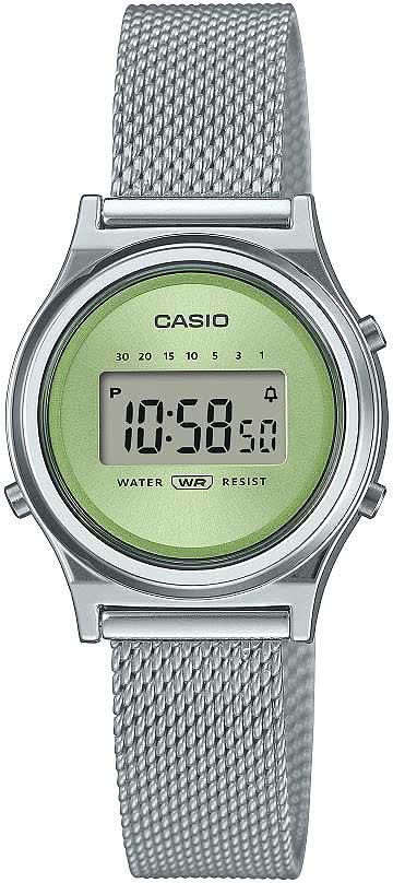 Damklocka Casio med silverfärgat mesh-armband och grön digital urtavla, runt boett