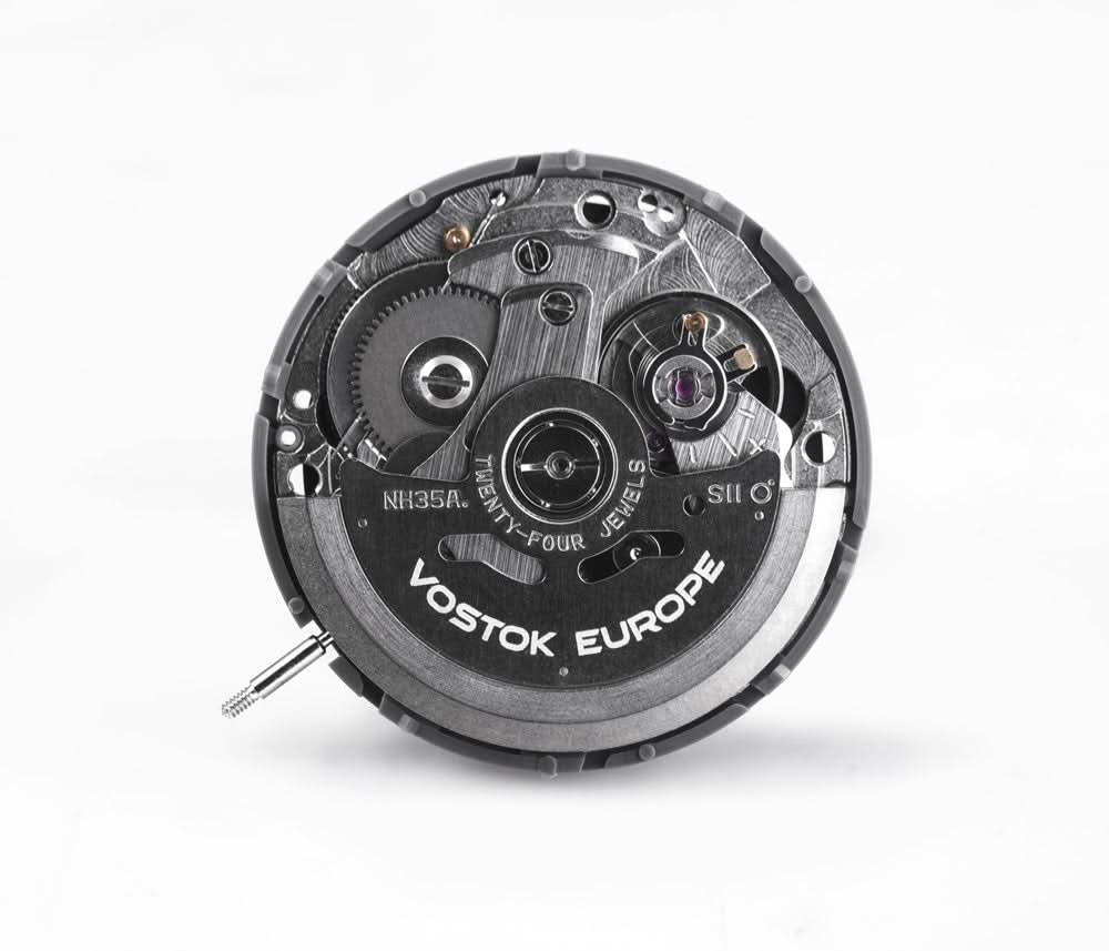 Herrurverk, öppet med synliga komponenter och rotor