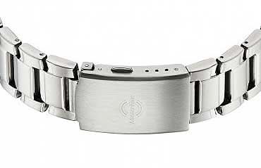 Baksida av klockboett i rostfritt stål med metallarmband