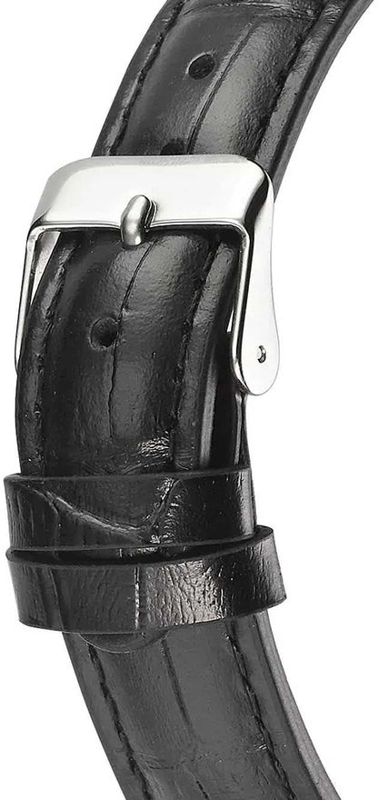 "Damklocka med svart läderarmband och metallfäste vid boettens undersida"