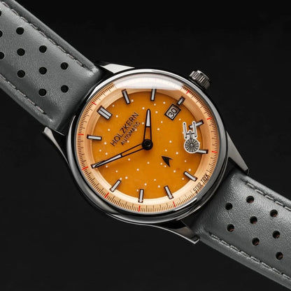 Herrklocka med orange urtavla och grått läderarmband, automatisk krona