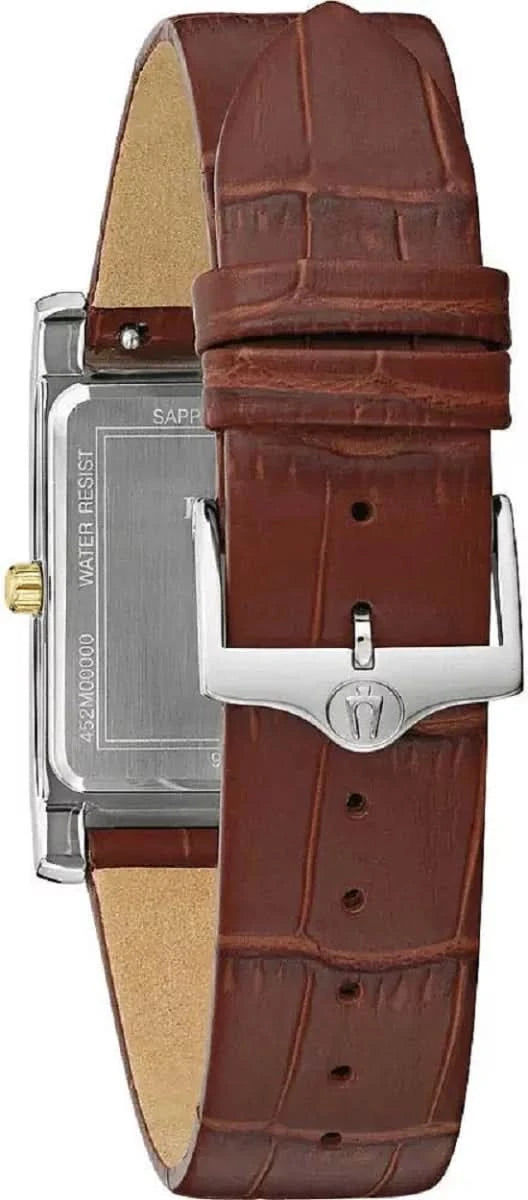 Herrklocka med brunt läderarmband och stiftspänne, silverfärgat hölje och guldkrona