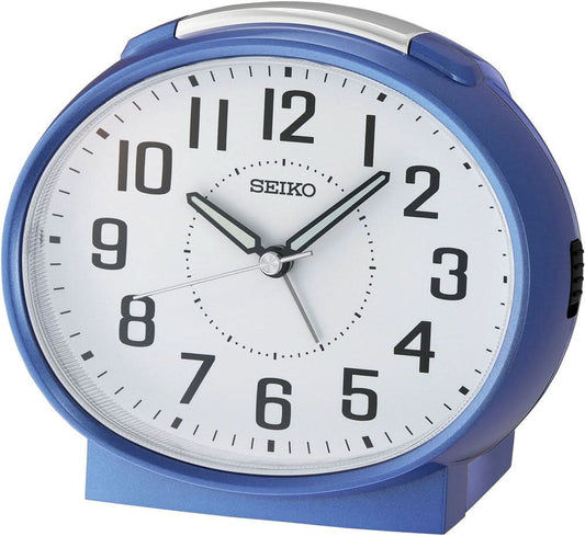 Blå analog väckarklocka i plast med vit urtavla, svarta visare och SEIKO