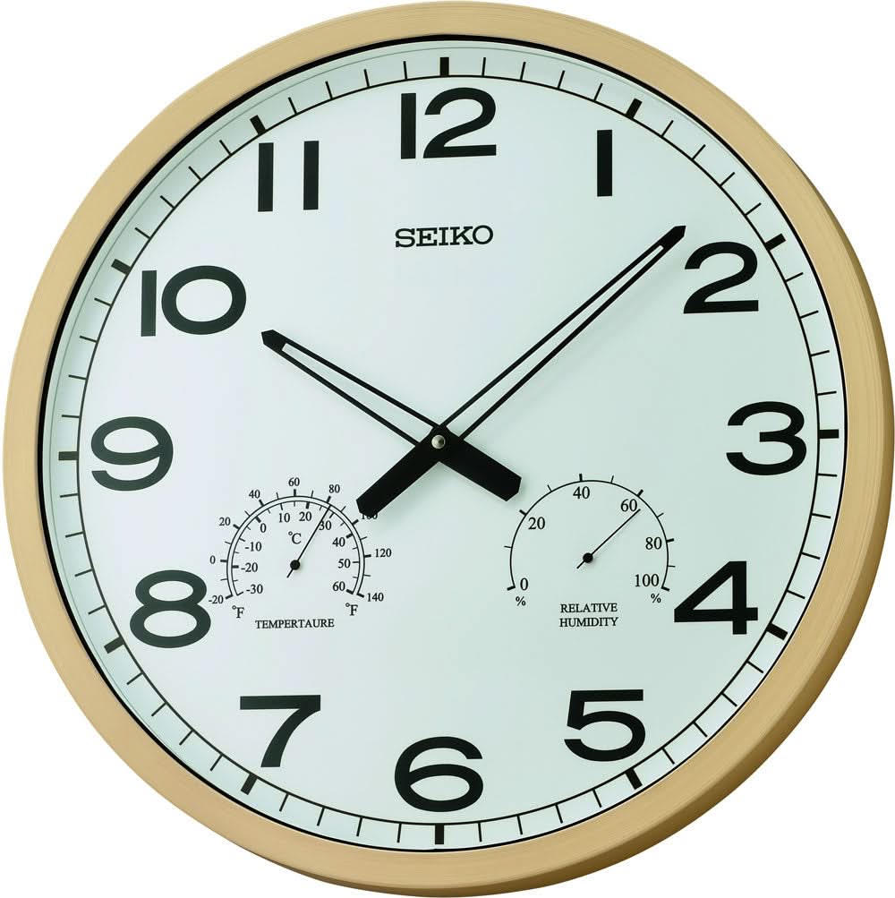 Väggklocka med beige plastram, vit urtavla, svarta siffror och visare, Seiko