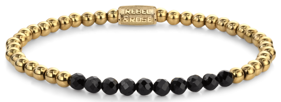 Armband med fasetterade svarta spinellpärlor och guldfärgade pärlor i rostfritt stål