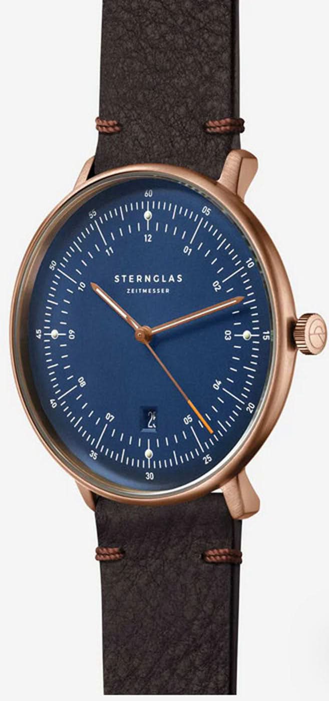 Herrklocka med blå urtavla, brunt läderarmband och synlig krona, roséguld