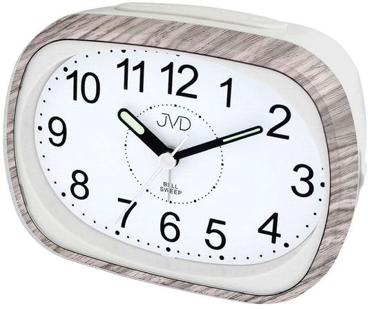 Klassisk analog väckarklocka med vit urtavla, svarta visare och JVD-logotyp