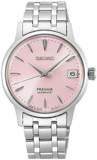 "Damklocka från Seiko Presage med rosa urtavla, datumfönster och armband i rostfritt stål"