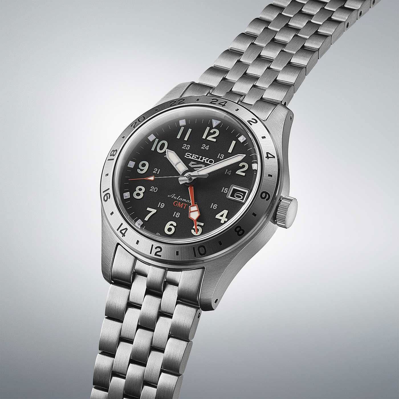 Herrklocka med armband i rostfritt stål och svart urtavla, infattning med index