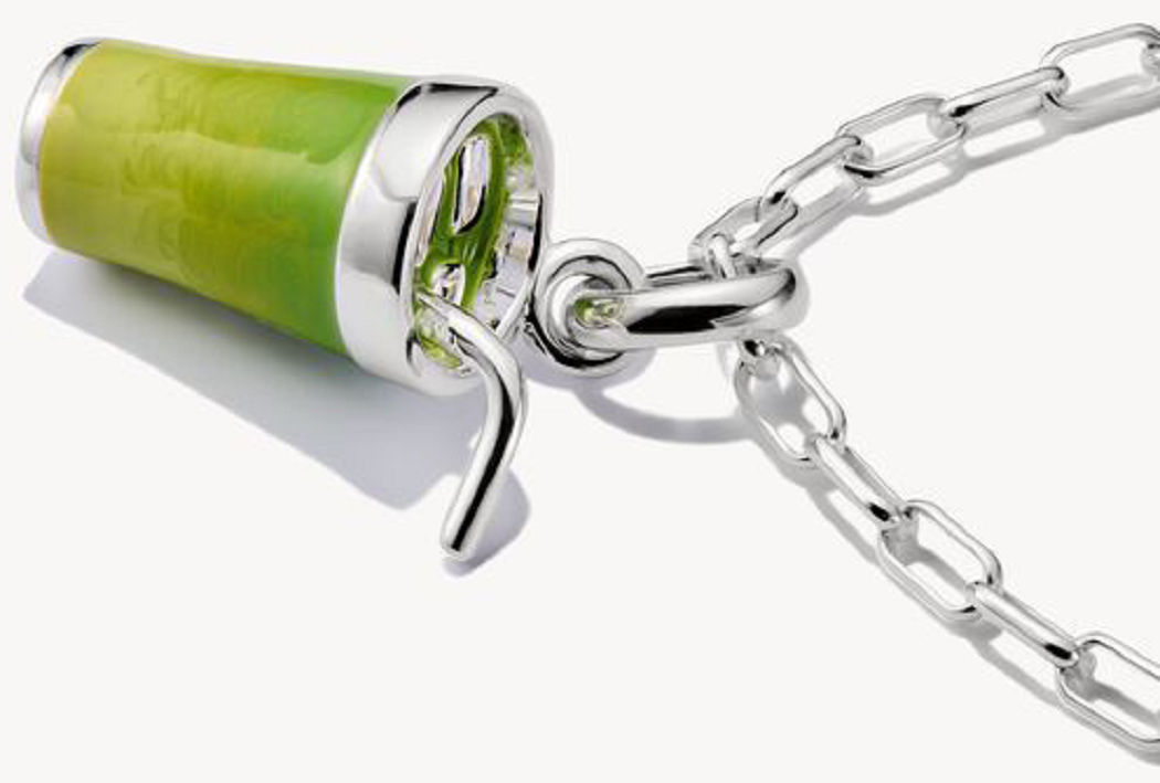 Silver charm pendant on carabiner, green cup with detailed enamel