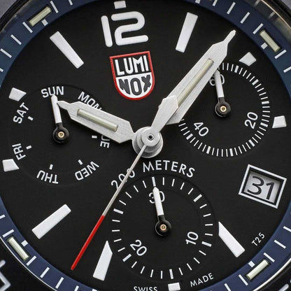 Dykarklocka med stor självlysande visare, LUMINOX-logotyp, datum 31