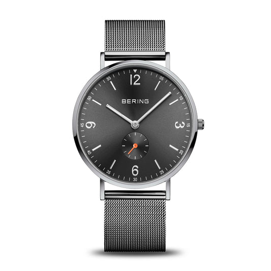 Bering Herrenuhr mit grauem Zifferblatt, Metallband und kleiner Sekunde mit orangefarbenem Akzent