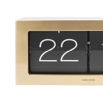 Karlsson Flip-Uhr im goldenen Gehäuse, schwarzes Ziffernfenster mit Klappzahl 22
