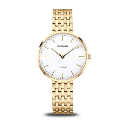 Bering Titanium 19334-334 Damenuhr Gold • Saphirglas • Titan-Gliederarmband