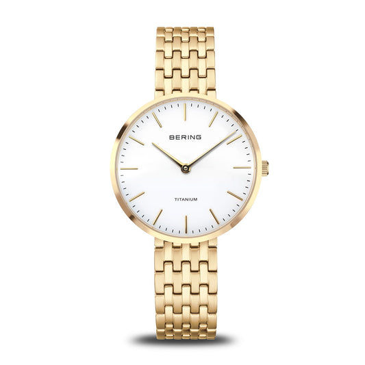 Bering Damenuhr mit goldfarbenem Titan-Gliederarmband und weißem Zifferblatt