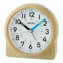 Brauner Seiko Wecker mit rundem Zifferblatt, arabischen Zahlen und blauen Zeigern