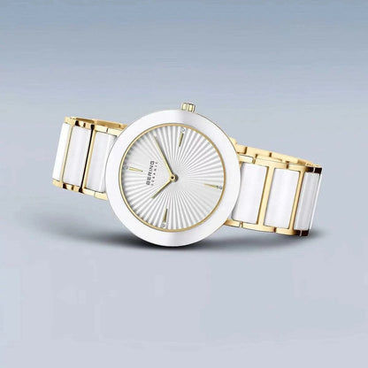 Bering reloj de mujer con pulsera de cerámica blanca y bisel dorado, vista general