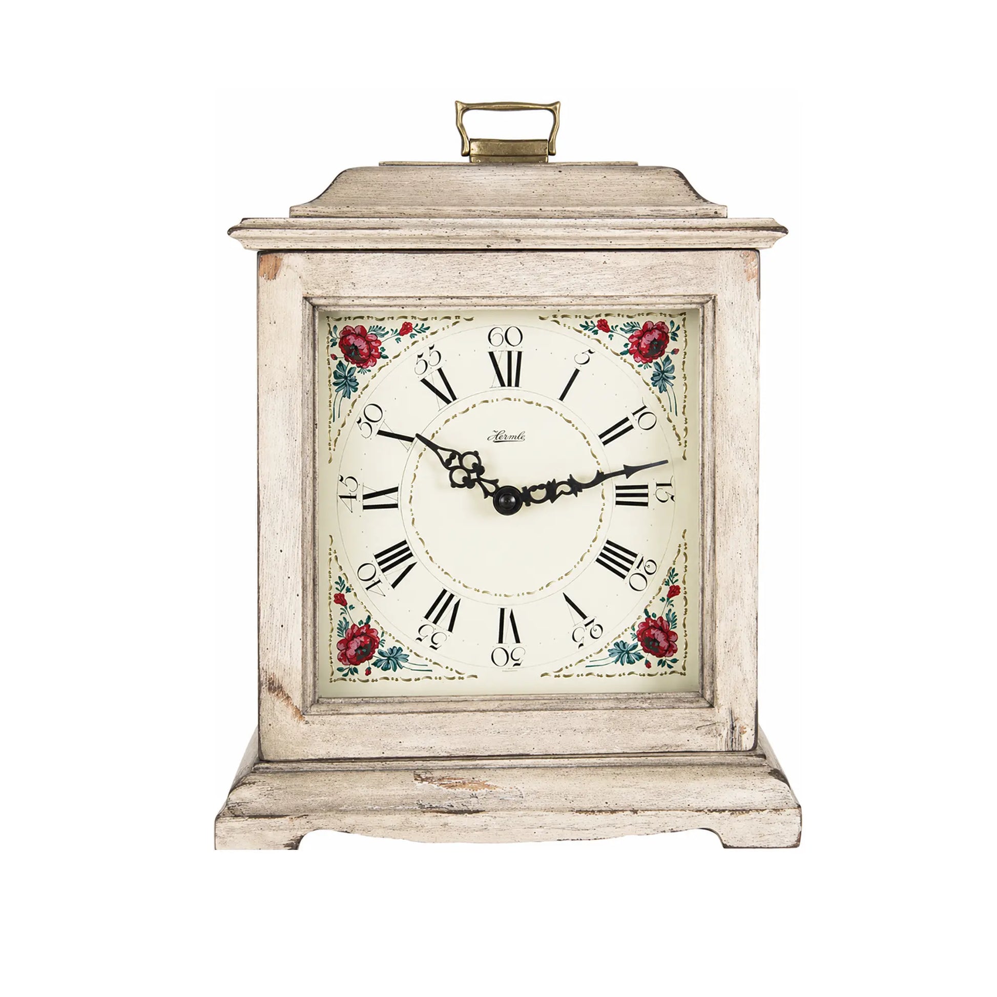 Reloj de mesa de madera estilo vintage con esfera floral, números romanos y asa en la parte superior