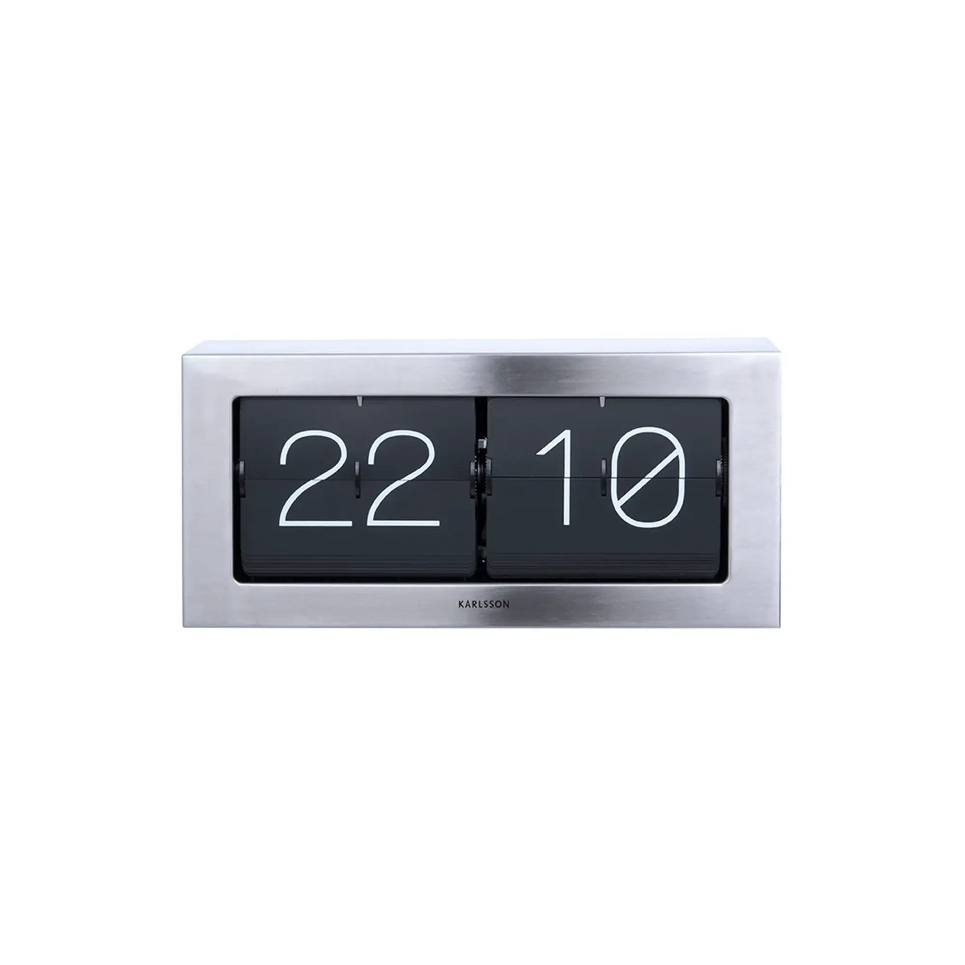 Tischuhr mit Klappzahlen-Mechanismus im rechteckigen Stahlgehäuse, Anzeige „22 10“.