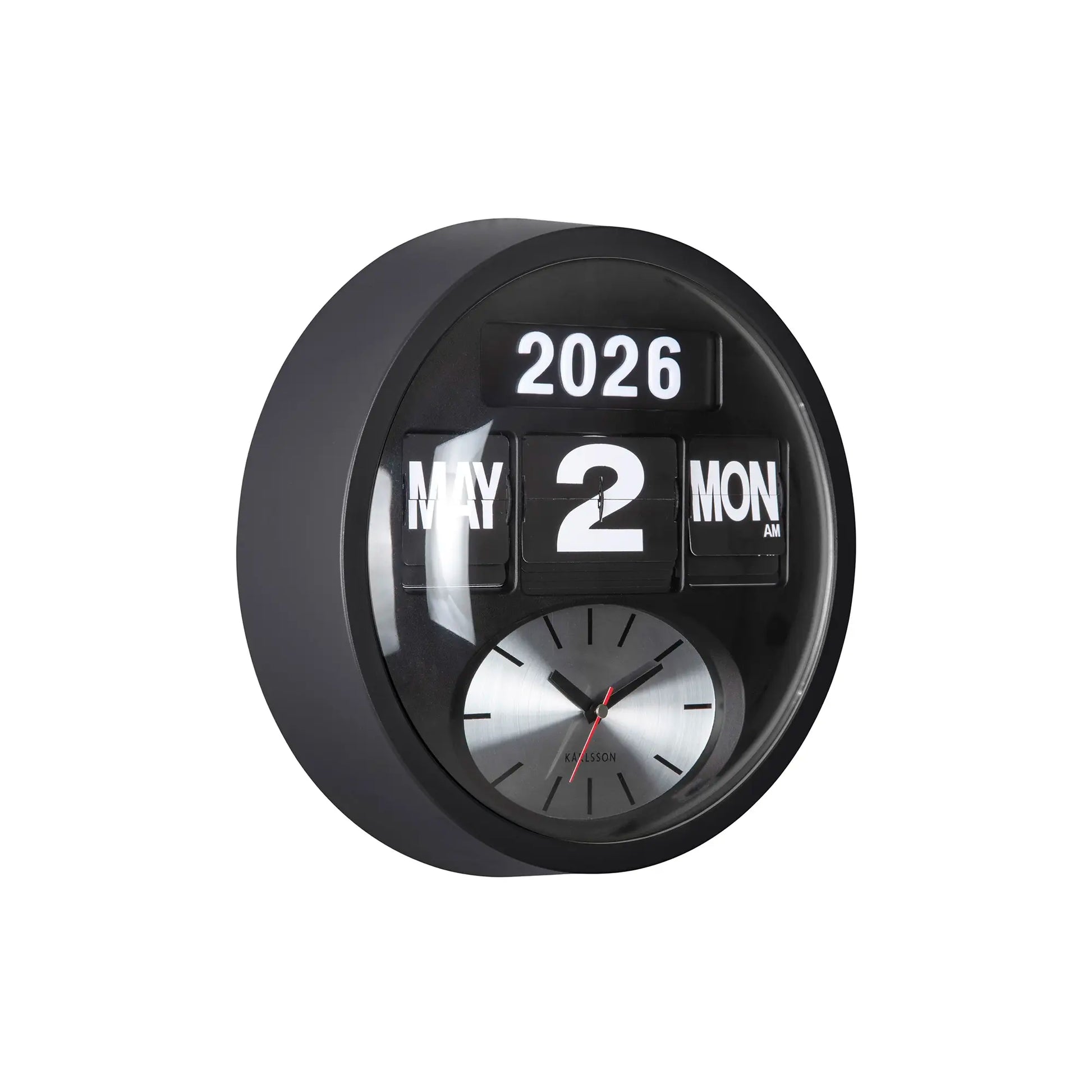 Schwarze runde Wanduhr mit Flip-Zahlen „2026“ und analogen Zeigern